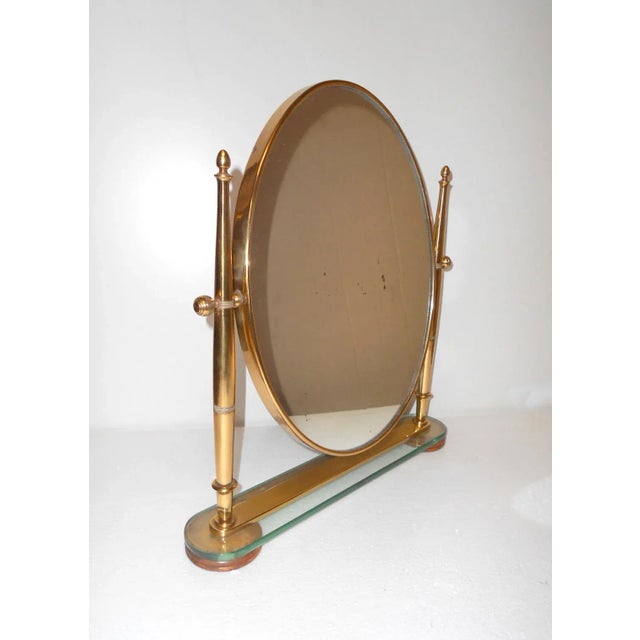 Very rare mirror table-vanitas,made in Italy by Fontana Arte. All original and brass with original patina. Base in green...