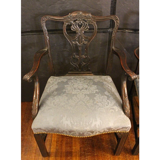 Late 19th century pair of George III style arm chairs, likely Philadelphia. A very fine Colonial Revival movement pair,...