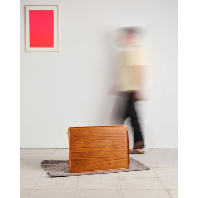 A beautifully designed coffee table made of solid teak, designed by holger georg jensen and manufactured by kubus in...