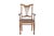 This Vintage Anglo-Indian Teakwood Armchair is handcrafted from solid teakwood, featuring a graceful shield-style back...