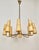 Mid-century chandelier with eight arms in brass. The arms are made from hexagonal tubbing giving the chandelier a unique...