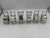 A rare and whimsical set of six silver plated figural napkin rings, each masterfully crafted in the form of a rustic twig...