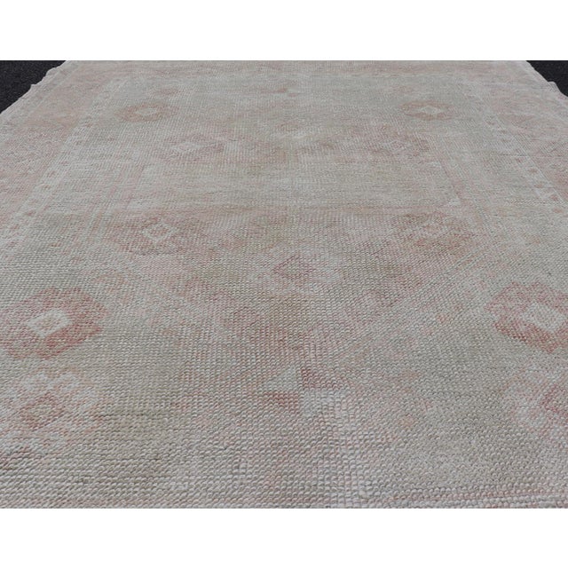 Vintage Oushak Rug With Pastel Colors in Tan, Green, Butter Yellow, and Pink For Sale - Image 11 of 12