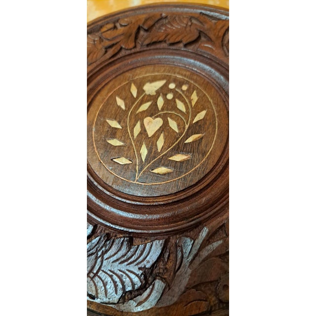Folding side table or pedestal in exotic wood, hand-carved by a master craftsman from India. Vintage style with inlaid...