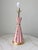 1950's Atomic Style pink and gold speckled ceramic table lamp. The lamp base measures 7.75" x 7.75"and the height to the...