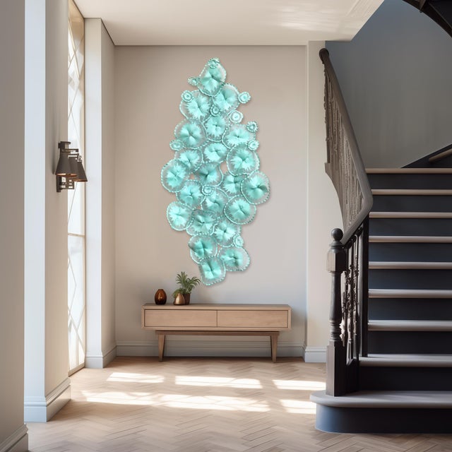 Atticus Adams' organically composed modern metal sculptures embody the transformative power of art, illustrating the...