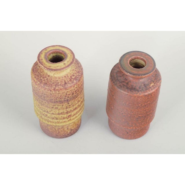 Mobach Ceramics, Holland Two vases, mid-20th century. Pair of hand-thrown stoneware vases with the characteristic Mobach...