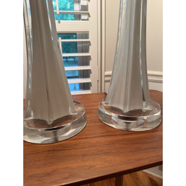 Striking pair of monumental vintage column lamps dating to approximately the 1980s. These substantial lamps feature tall,...