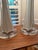 Striking pair of monumental vintage column lamps dating to approximately the 1980s. These substantial lamps feature tall,...