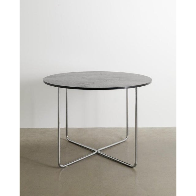 A very rare and early mid century bauhaus "B27" round console / dining table with a beautifully patinated chrome tubular...