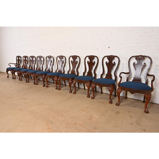An outstanding set of ten Georgian or Chippendale style dining chairs From the prestigious "Stately Homes Collection" by...