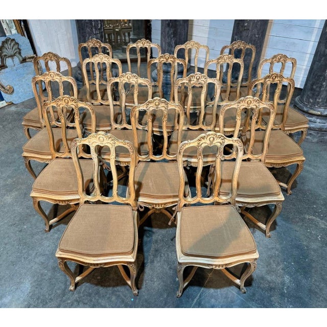 A very rare chance to buy a long set of 18 French Farmhouse Dining Chairs. Made from solid Oak and dating to the early...