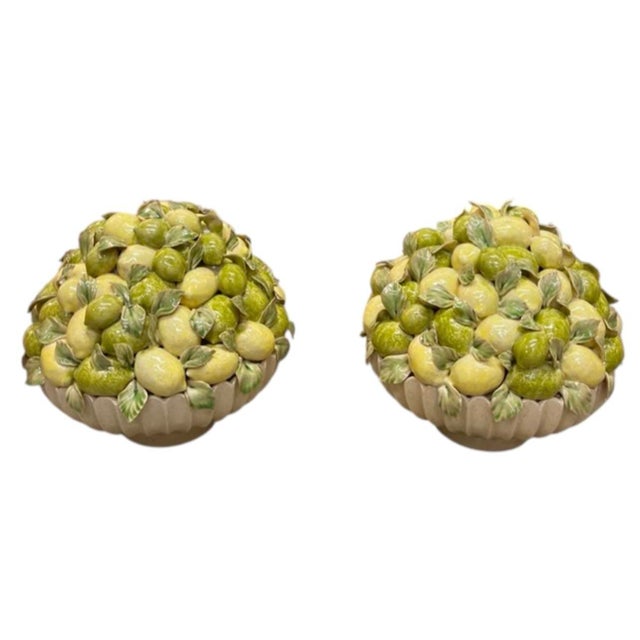 This stunning pair of vintage ceramic decorative pieces brings a vibrant touch of Mediterranean elegance to interior...