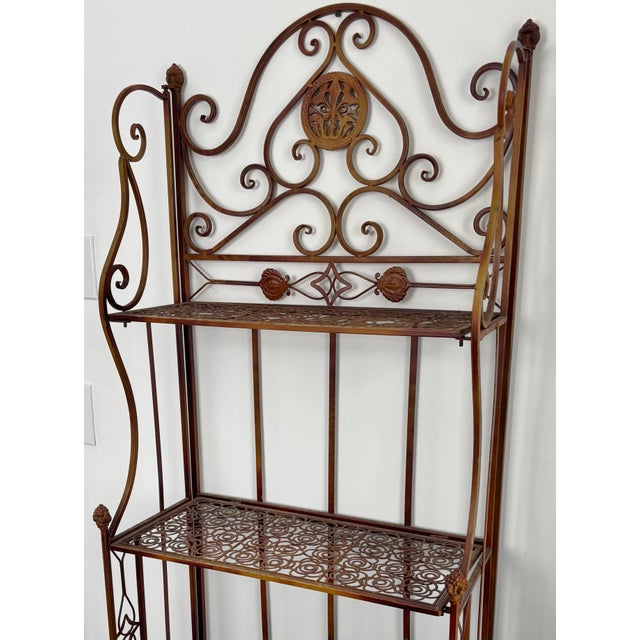 Vintage French style baker's rack, useful in so many ways. Utilize its three shelves in its traditional capacity or its...