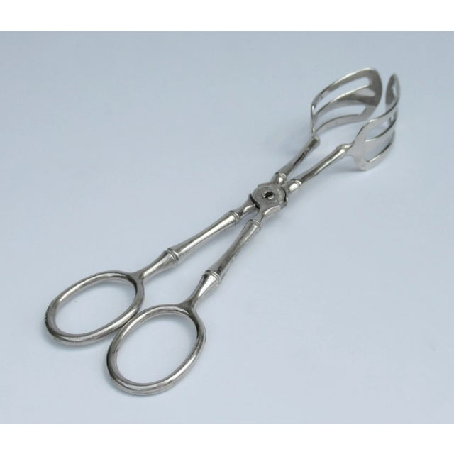 Vintage; Italian "Faux-Bamboo," style silver-plate, scissor serving tongs, with vented openings of grasp ends. In the...