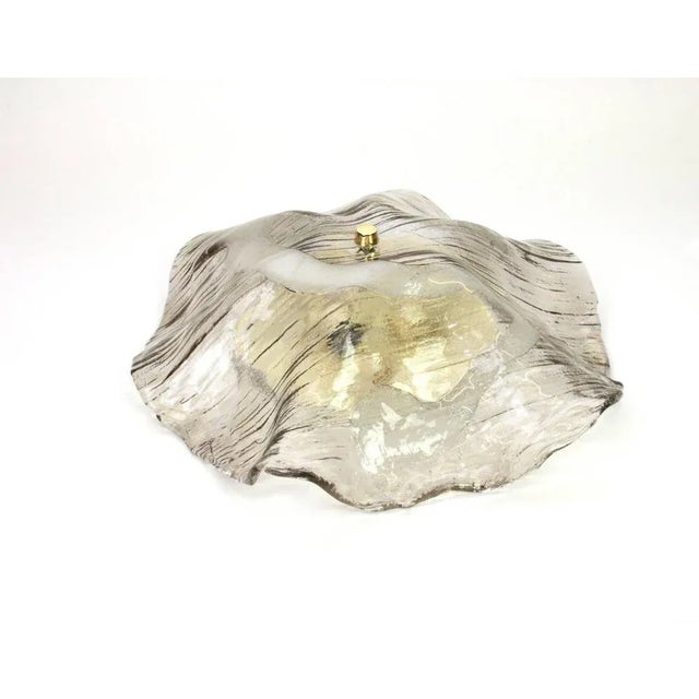 1 of 2 large flush mount lights designed by Kalmar, Austria, 1970s Wonderful large organic Murano glass / bi-colored clear...