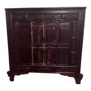 Late 20th Century Monumental Chinese Style Carved Wood Wedding Cabinet With Timeworn Patina For Sale