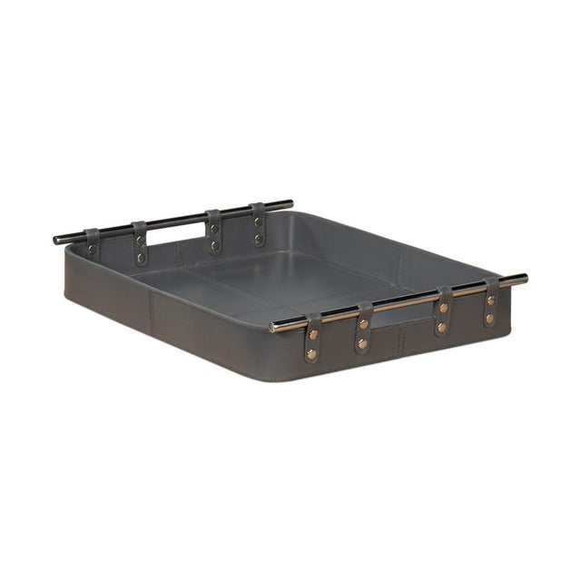 With quiet shade of grey leather, this leather tray is fraught with detail: the topstitching of each leather panel, the...