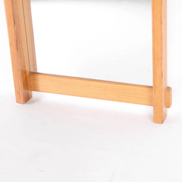 Large design wooden mirror. Can fit an antique decor or a modern decor. Timeless design.