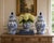 A classic pair of blue and white ginger jars, decorated throughout with delicate bird and flowering branch motifs. The...