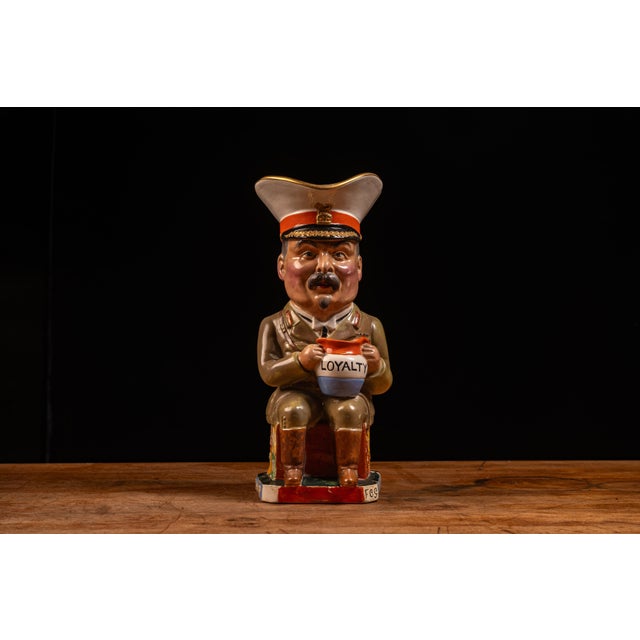 Antique Royal Staffordshire Pottery Toby jug designed by Francis Carruthers Gould and manufactured by Arthur J. Wilkinson....