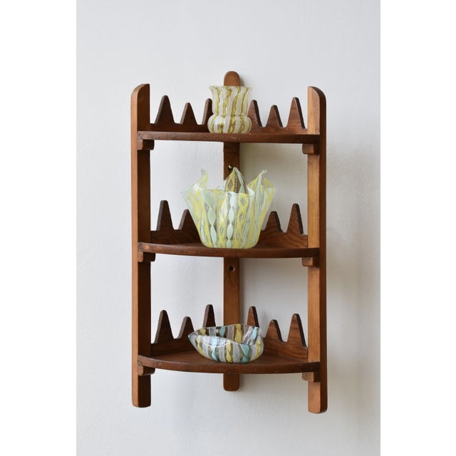 Vintage Sawtooth Edge Tiered Corner Shelf, Circa 1950s-60s. Three-tiered, handmade pine corner shelf with exaggerated...