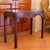 A sleek game table that can double as a small console table or side table. The contours are unusually dramatic, with...