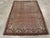 This mid-20th-century Persian Malayer accent rug presents a finely patterned allover composition across a muted blue...