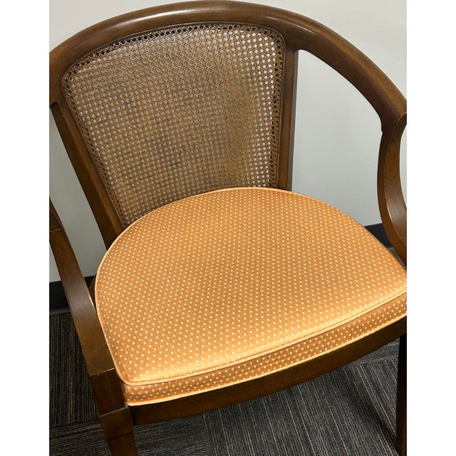 Cane back barrel chair with solid wood frame. Attractive, sturdy and in excellent condition. 31”tall, 22 1/2”wide and...