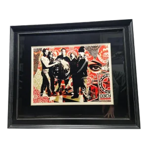 Shepard Fairey "She's Not a Planet, She's One of Us" Framed Print