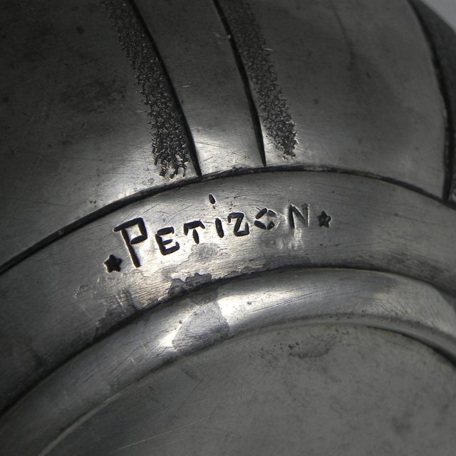 Elegant petizon pewter vase, 20th century, decorated with graceful fern leaves. height: 16 cm. ø: 16 cm. the vase is...