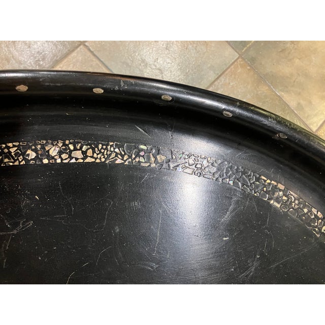 Two-piece coffee table composed of a detachable top and base, dating to the 19th century. The tabletop is crafted in...