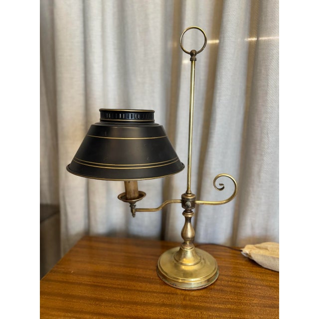 Antique French Bouillotte brass and Tole table lamp. Original wiring and in working condition. Lampshade is black tole and...