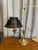 Antique French Bouillotte brass and Tole table lamp. Original wiring and in working condition. Lampshade is black tole and...
