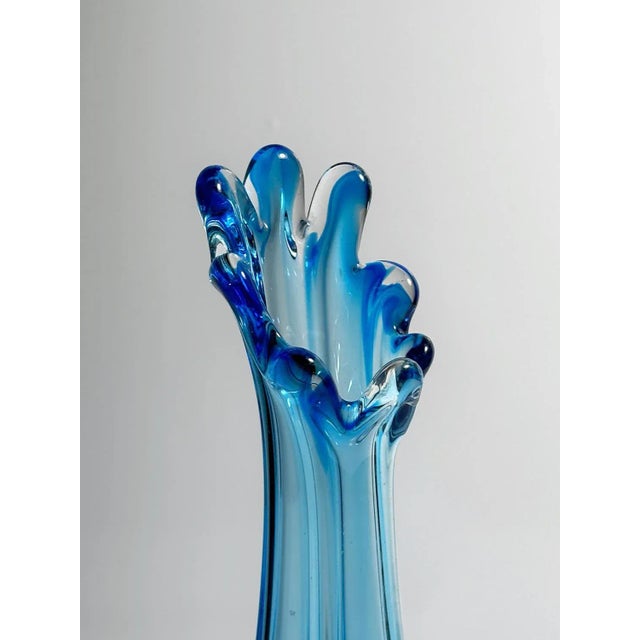Very beautiful glass vase from Italy. Mixed glass in transparent and cobalt blue colour streaks that run through the...