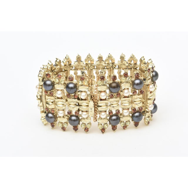 This lovely vintage dressy gold plated cuff bracelet is from the 50's. It is signed Francois and was a division of The...