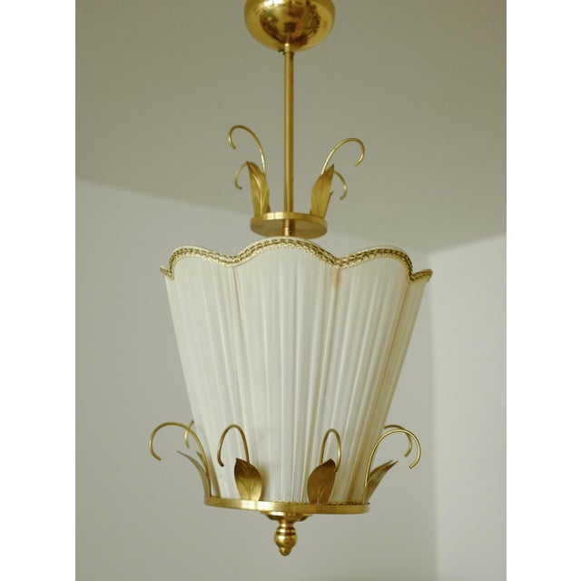 Gorgeous Swedish 1940/50s Brass and Silk pendant by E. Hansson &amp; Co., Malmö, Sweden. One light source with a...