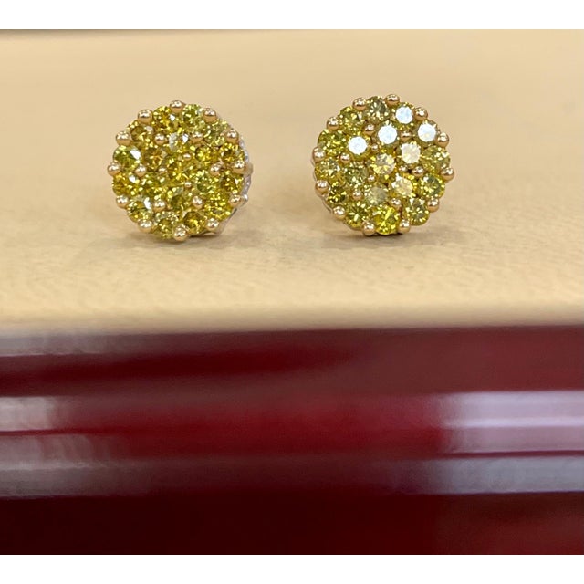 Approximately 2 Carat Yellow Diamond Floral Cluster Flower Stud Earrings 14 Karat White Gold A sweet, shimmery style for...
