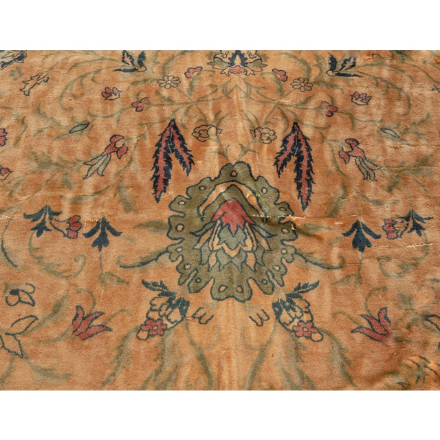 This exquisite oversized antique Indian rug, dating back to the 1920s, is a remarkable representation of the fine artistry...