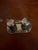 vintage Mexican Alpaca silver-tone salt and pepper shaker set featuring shimmering, iridescent abalone shell inlays on a...