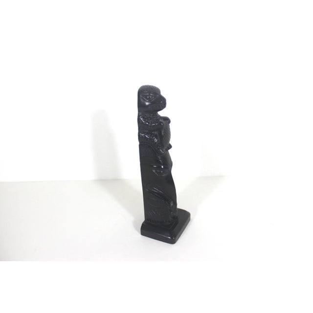 Width: 2 inches Height: 6.5 inches Depth: 1.5 inches Vintage small black totem pole sculpture by Boma Canada. Beaver,...