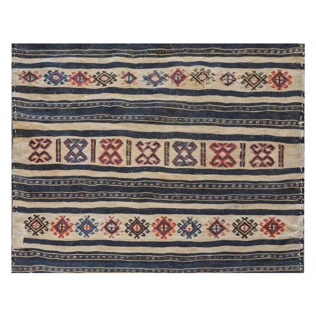 An outstanding early 20th century shahsevan bag face rug with an elaborately woven pattern containing solid stripes,...