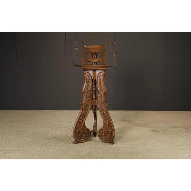 A rare and architecturally striking Victorian Rococo Revival rotating double lectern, dating from the mid-19th century and...