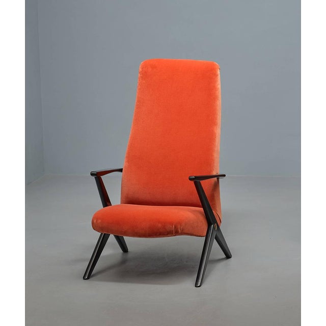 Swedish lounge chair designed by Bengt Ruda, renowned for his iconic Triva model. Featuring a distinctive high backrest,...