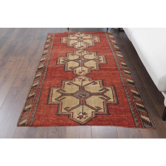 Vintage Turkish Hand-Knotted vintage rug is a semi-antique vintage area rug.'70s Eastern region of Turkey's unique rug is...