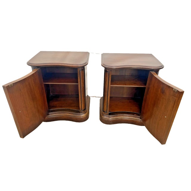 Pair of vintage Heritage Grand Tour bedside cabinets/nightstands featuring elegant European-inspired styling. These...