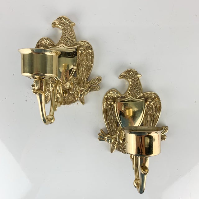 Fabulous pair of vintage brass American eagle with shield, brass hanging wall sconce candle holder. Heavy. Love the...