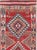 This mid-20th-century Turkish Anatolian tribal runner presents a bold sequence of four large diamond medallions arranged...
