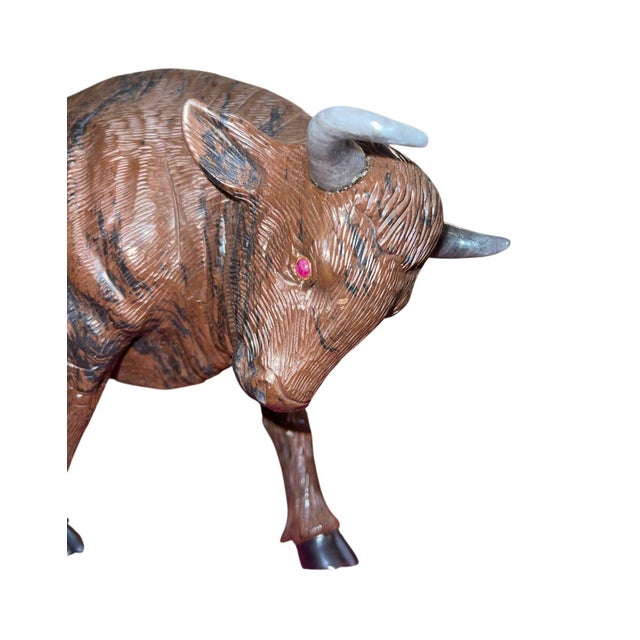 Exceptional carved brown & black obsidian bull sculpture, attributed to Manfred Gettman of Idar-Oberstein, Germany, and...