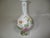 A vintage Lenox porcelain Japanese Chrysanthemum long neck vase. It is decorated with florals in colors of rose, yellow,...
